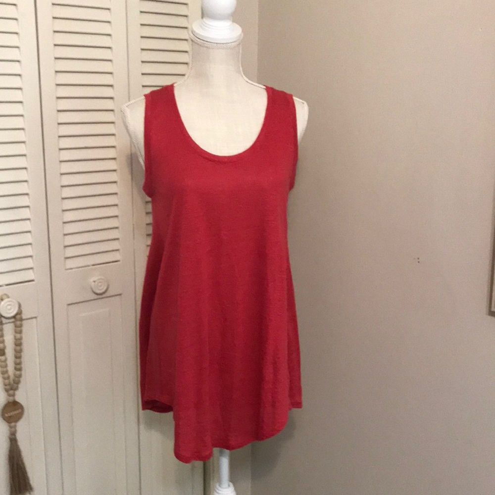 Women’s bathing suit cover size medium.